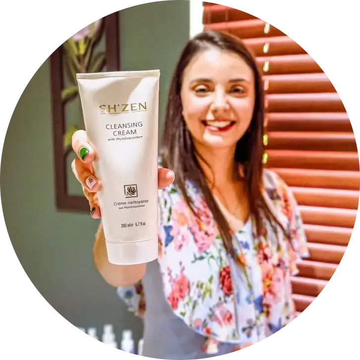 Bianca, owner of La oliva Beauty Salon in Brackenfell., posing with a SH'ZEN product